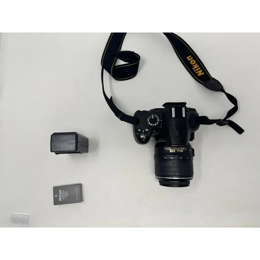 Nikon D3000 10.2MP DSLR Camera -Black-w/AF-S DX Nikkor 18-55mm 4-5.6G VR W/2GB